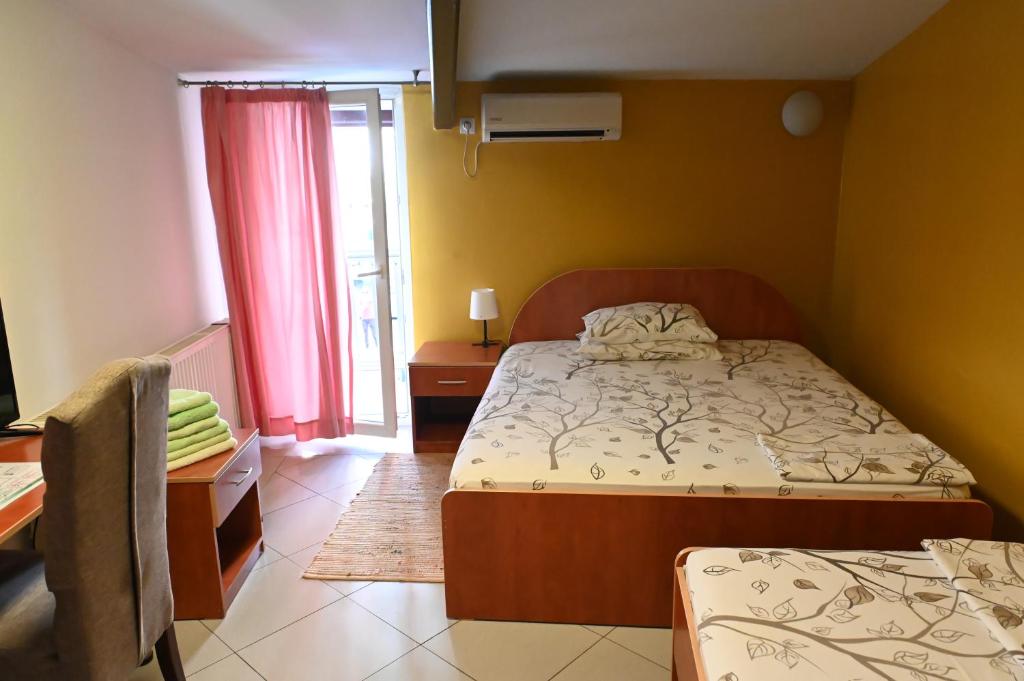 Postel nebo postele na pokoji v ubytování Apartments Imper - IMD