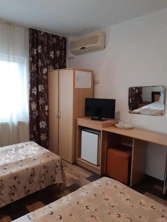Postel nebo postele na pokoji v ubytování Hotel Mya