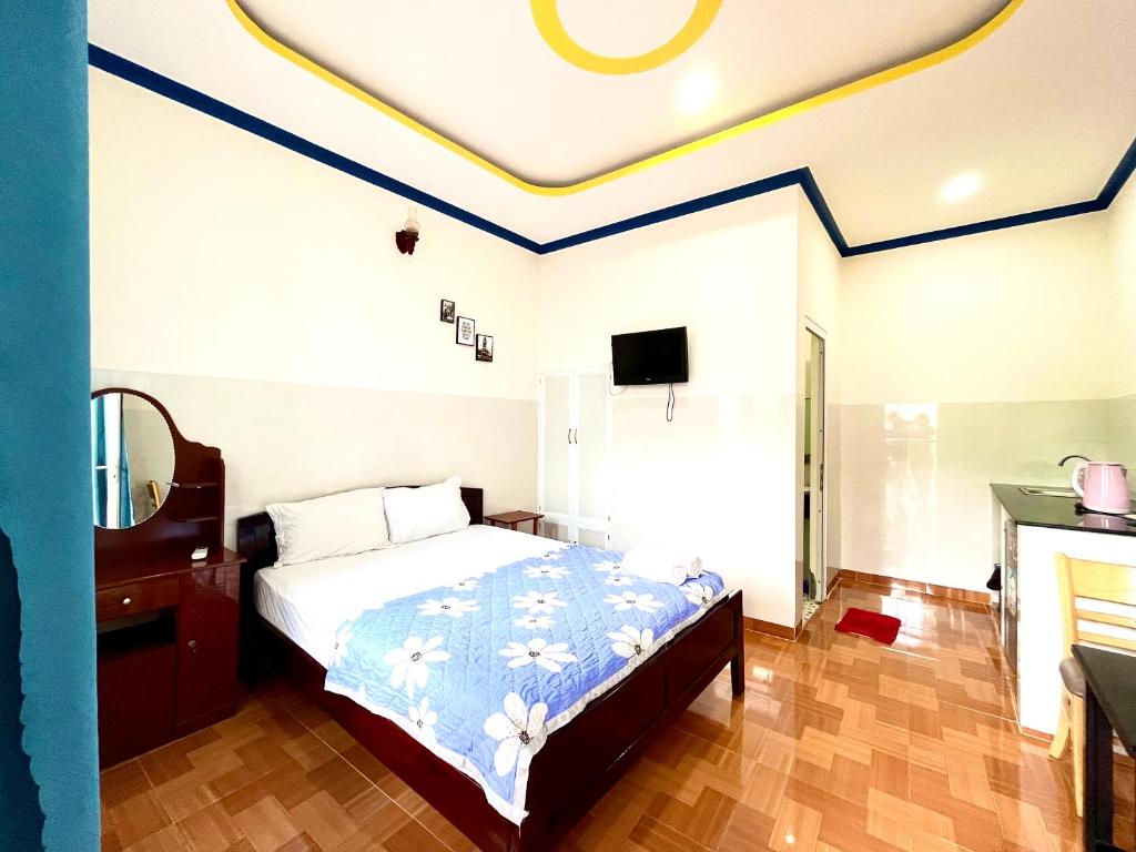Giường trong phòng chung tại Minh Khoi Guest House