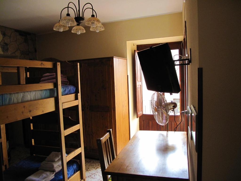 A bed or beds in a room at Diving Center Punta Stilo