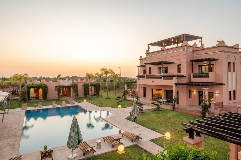 an aerial view of a house with a swimming pool at Villa Dar Laila in Marrakesh