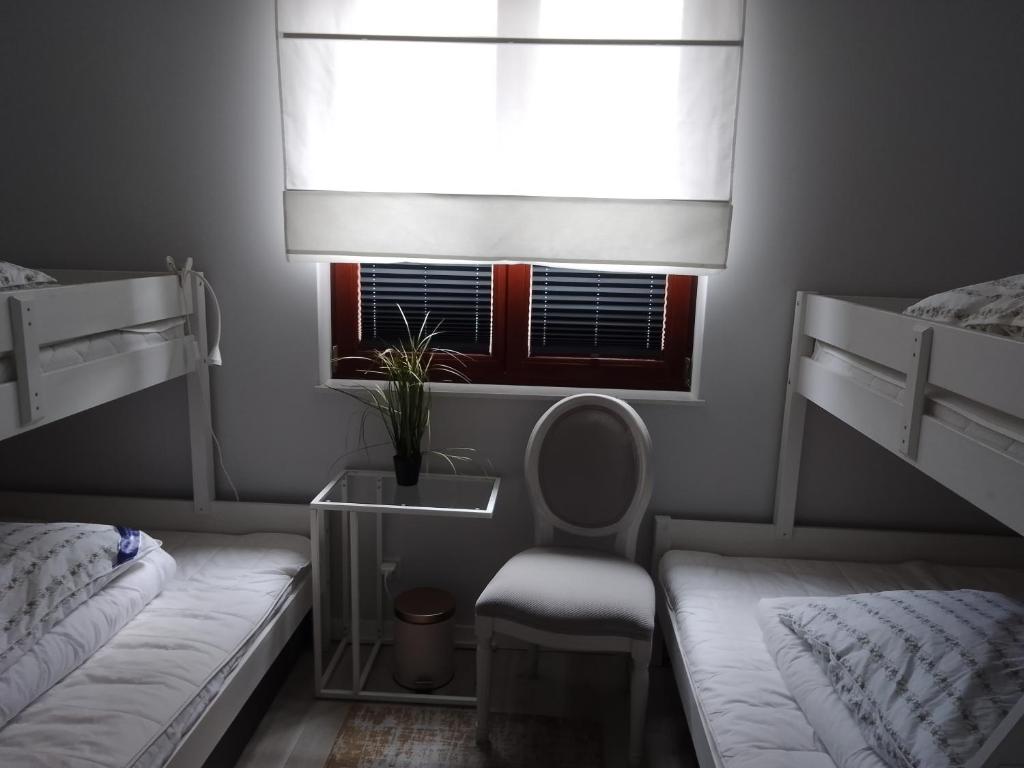Postel nebo postele na pokoji v ubytování Maritima's Home