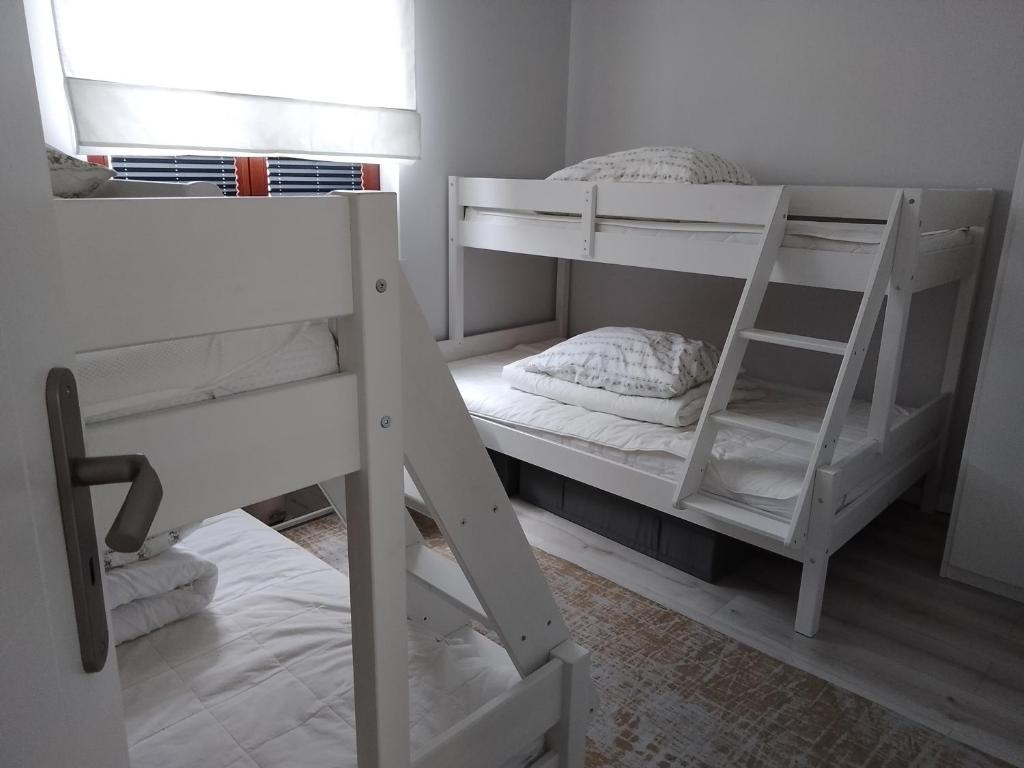 Postel nebo postele na pokoji v ubytování Maritima's Home