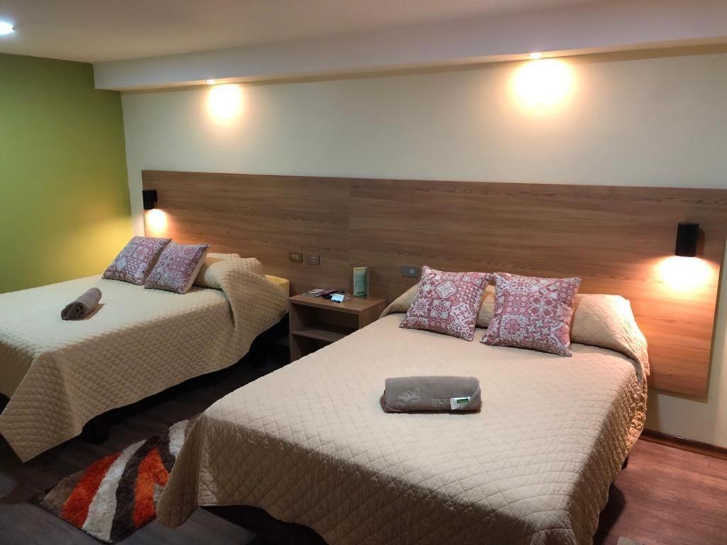 Postel nebo postele na pokoji v ubytování Hostal Terra 4 - EL LABRADOR