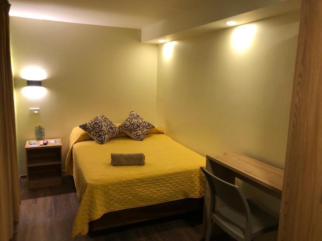 Postel nebo postele na pokoji v ubytování Hostal Terra 4 - EL LABRADOR