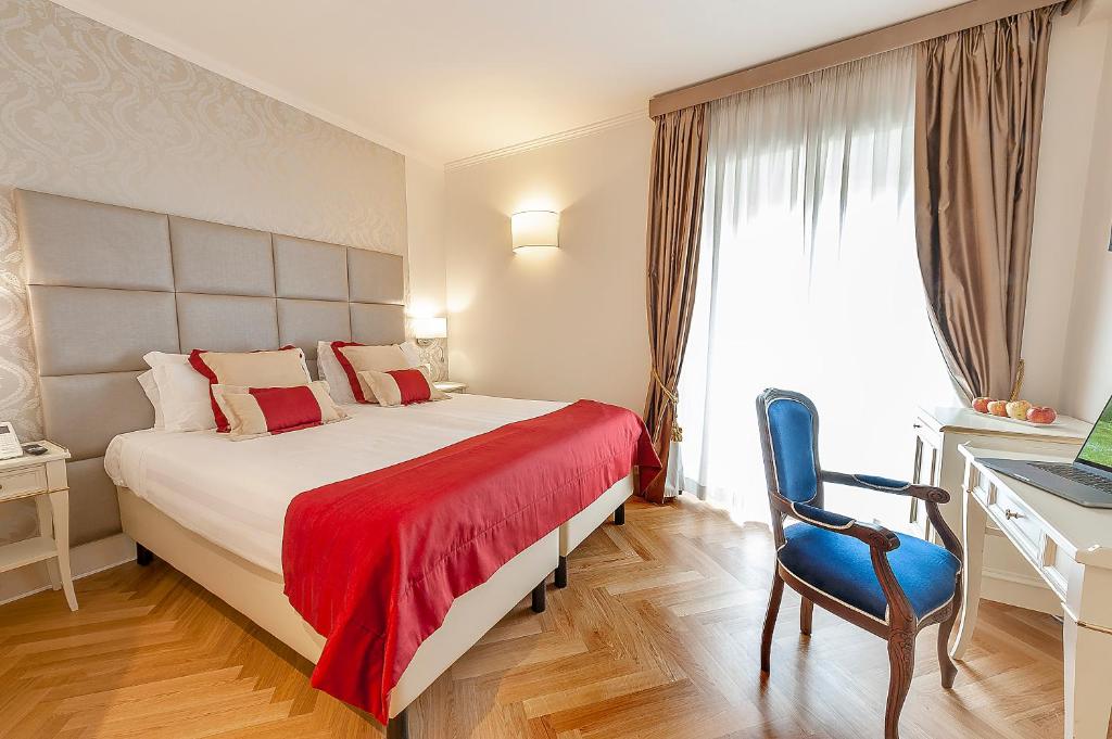 Posteľ alebo postele v izbe v ubytovaní Dei Priori Boutique Hotel