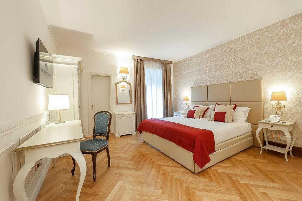 Posteľ alebo postele v izbe v ubytovaní Dei Priori Boutique Hotel