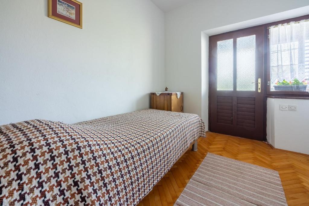 Postel nebo postele na pokoji v ubytování House Katica
