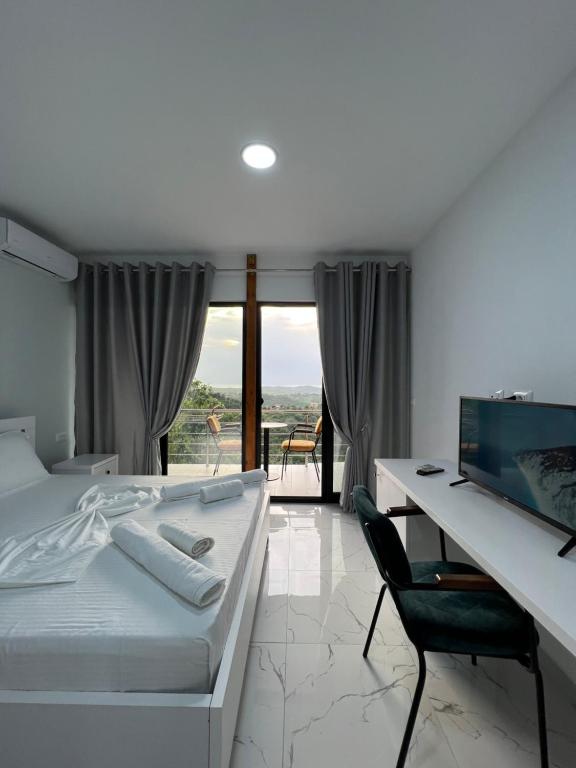 Postel nebo postele na pokoji v ubytování Restorant Hotel Xheni