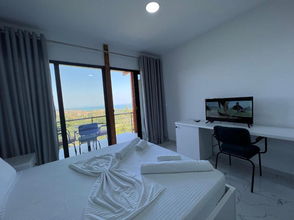 Postel nebo postele na pokoji v ubytování Restorant Hotel Xheni