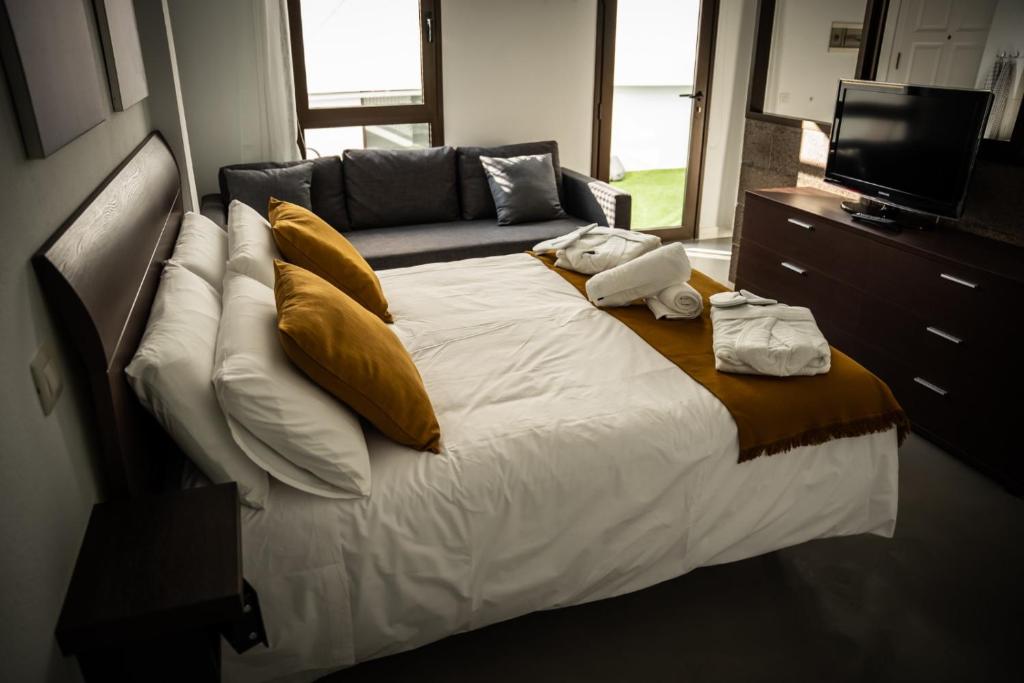 Postel nebo postele na pokoji v ubytování LOFT EL PATIO