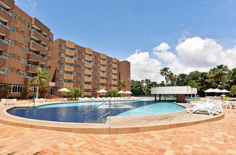 Bazén v ubytování Gran Lençóis Flat Residence nebo v jeho okolí