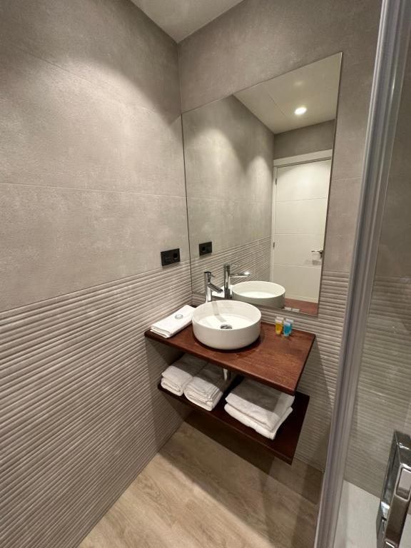 Ein Badezimmer in der Unterkunft Apartamentos Sunsets Málaga Centro