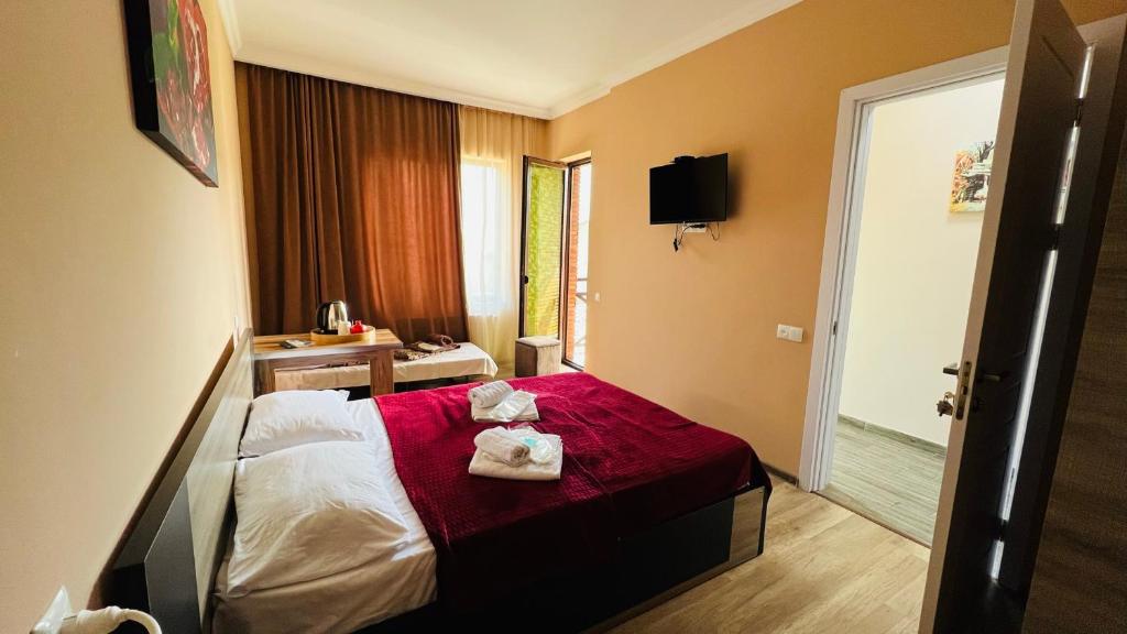 Postel nebo postele na pokoji v ubytování PALAZZO