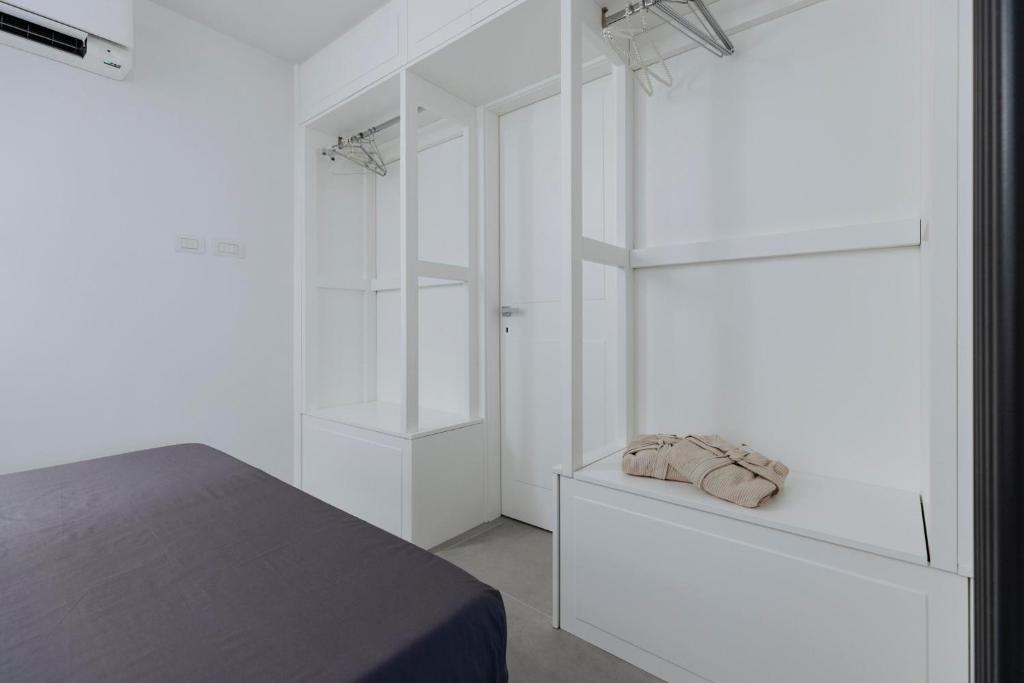Postel nebo postele na pokoji v ubytování Pantheon Experience Suite