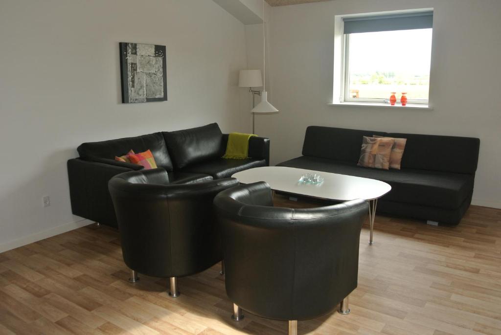 Posezení v ubytování Fitting Landsbyferie Apartments
