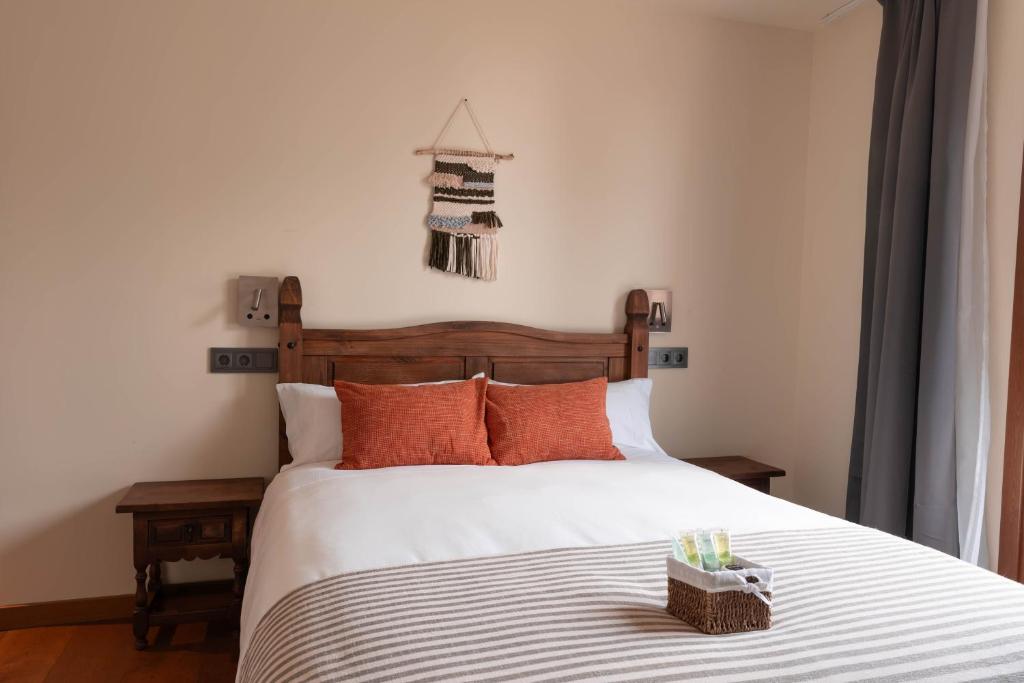 Postel nebo postele na pokoji v ubytování HOTEL POSADA LaS RETAJAS