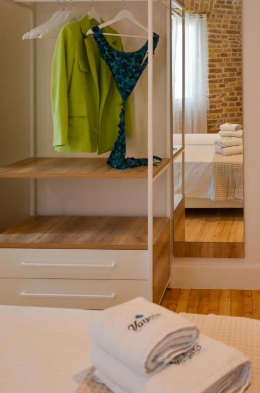 Postel nebo postele na pokoji v ubytování Vailato Loft Suites