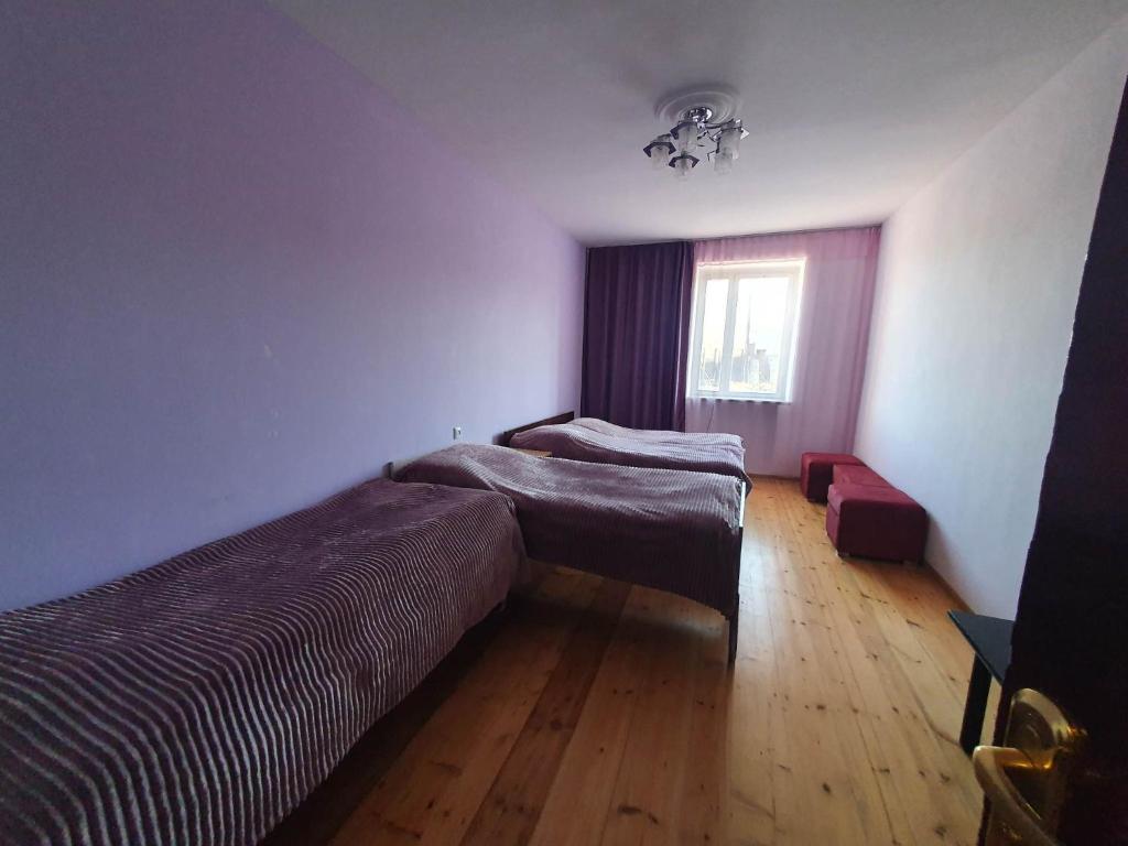 Postel nebo postele na pokoji v ubytování Moreni Guest House