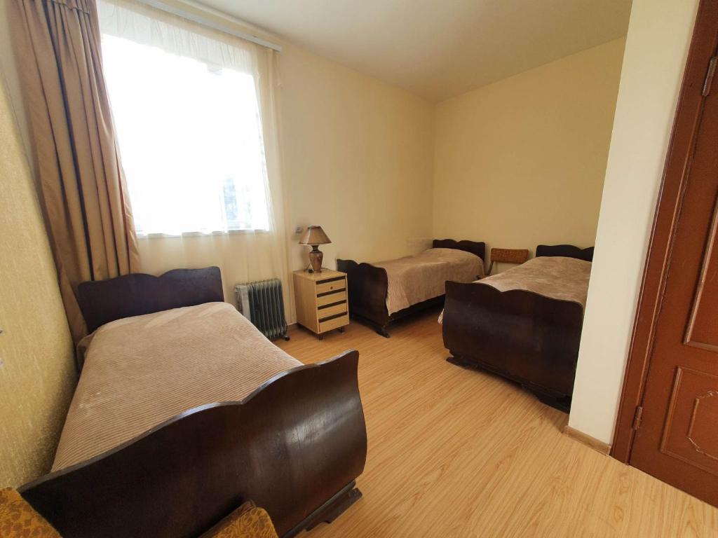 Postel nebo postele na pokoji v ubytování Moreni Guest House
