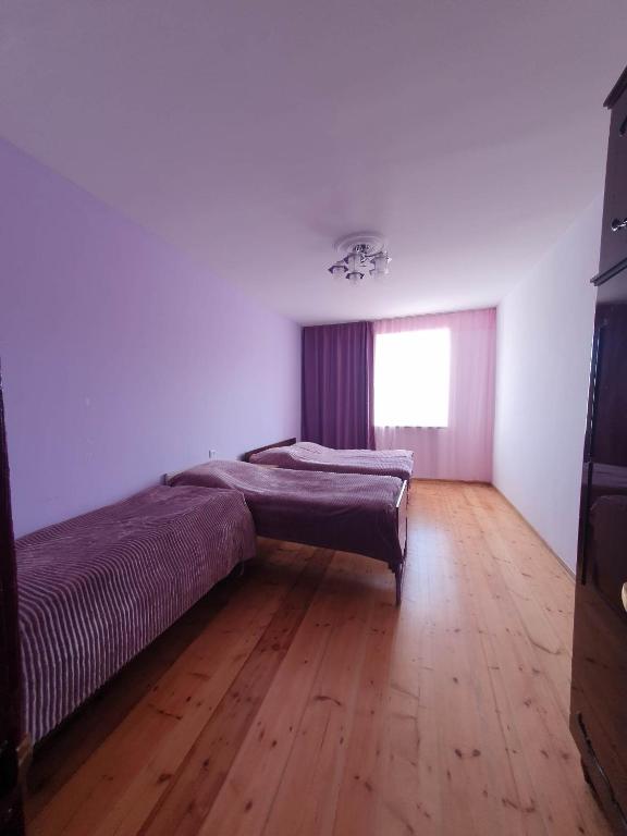 Postel nebo postele na pokoji v ubytování Moreni Guest House