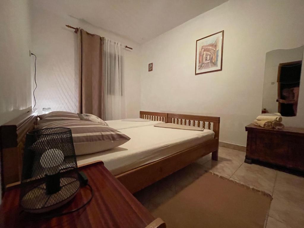 Postel nebo postele na pokoji v ubytování Apartmani Meri
