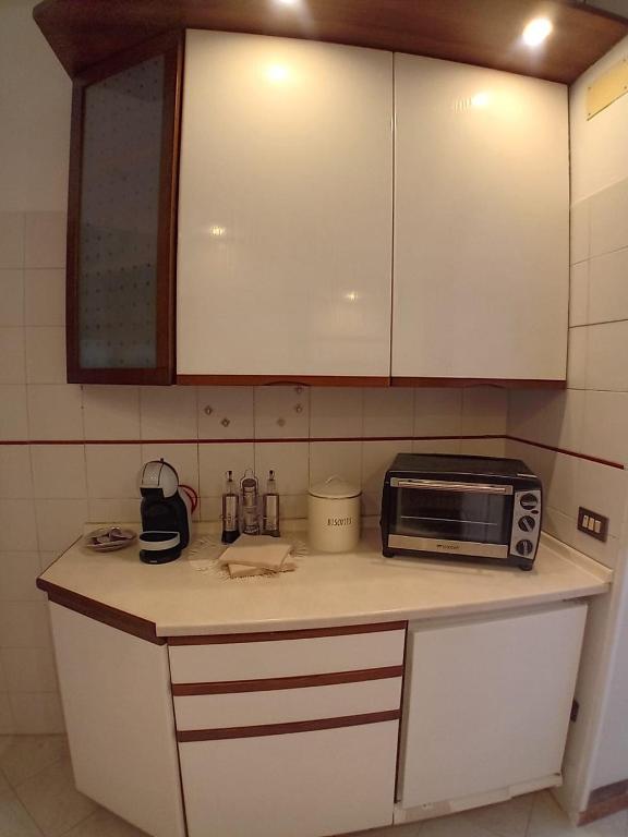 Kuchyň nebo kuchyňský kout v ubytování CORTE Apartment