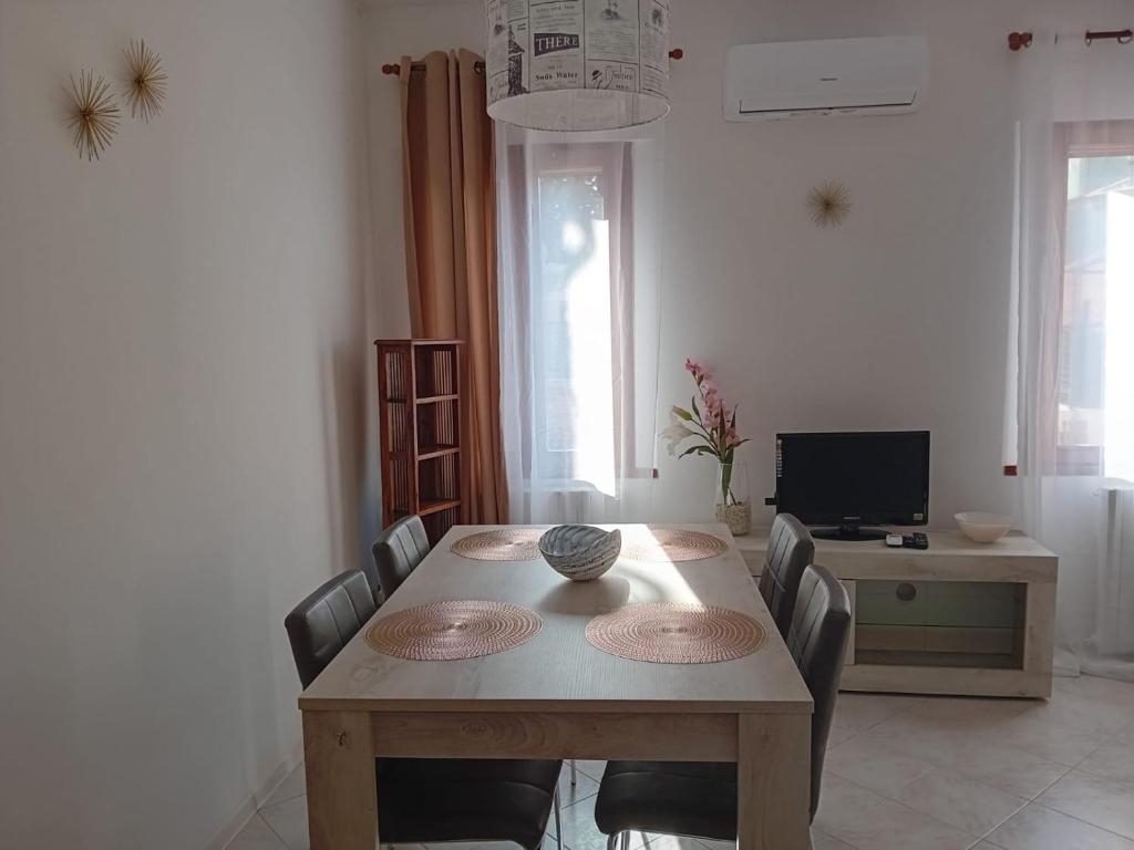 TV a/nebo společenská místnost v ubytování CORTE Apartment