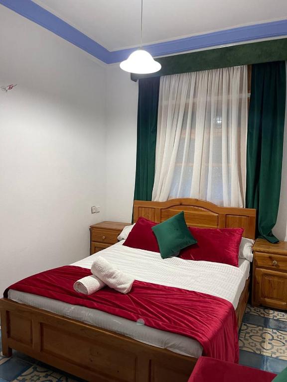 Voodi või voodid majutusasutuse Hôtel Al Kalaa toas