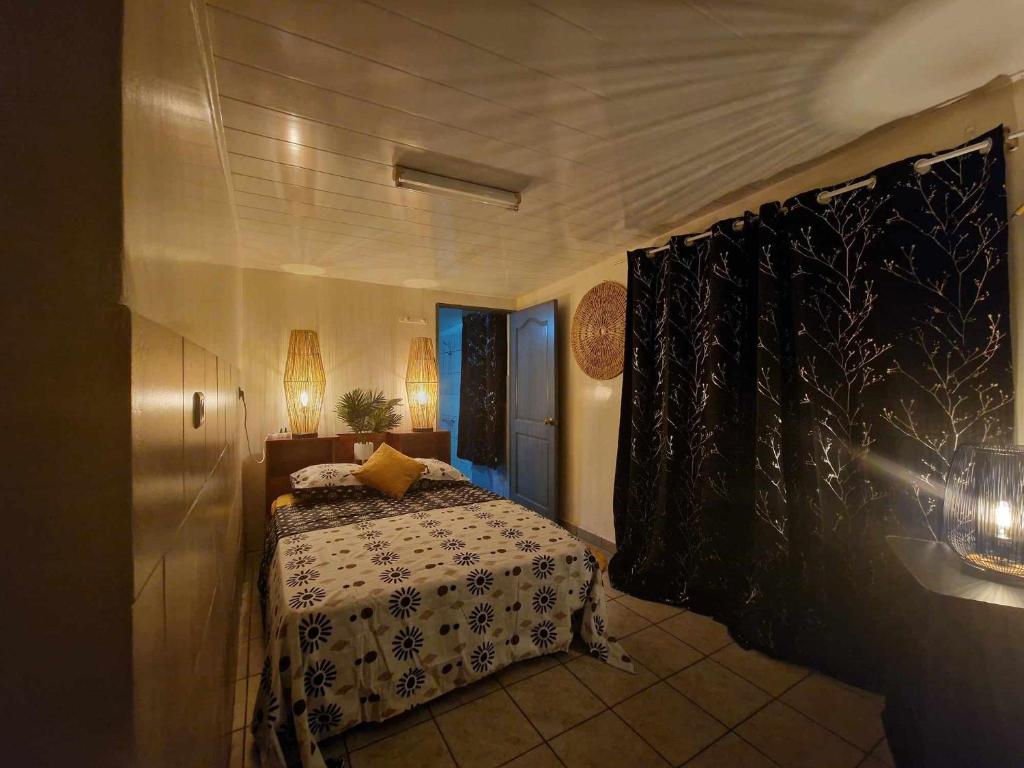 A bed or beds in a room at HIME LODGE