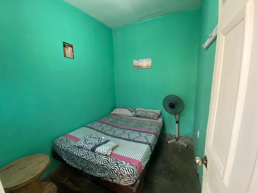 Postel nebo postele na pokoji v ubytování Sunset guest house