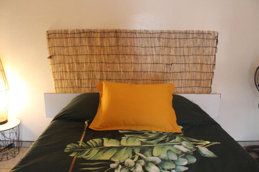A bed or beds in a room at HIME LODGE