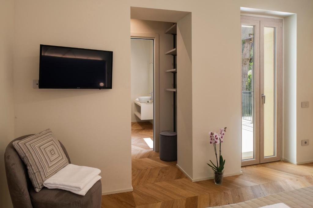 TV a/nebo společenská místnost v ubytování Marna Relais