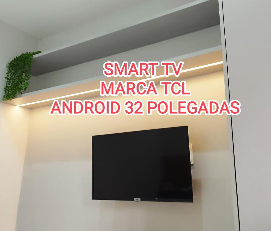 a sign that says smart tv marica t and android tablets at C3 STUDIO in Rio de Janeiro