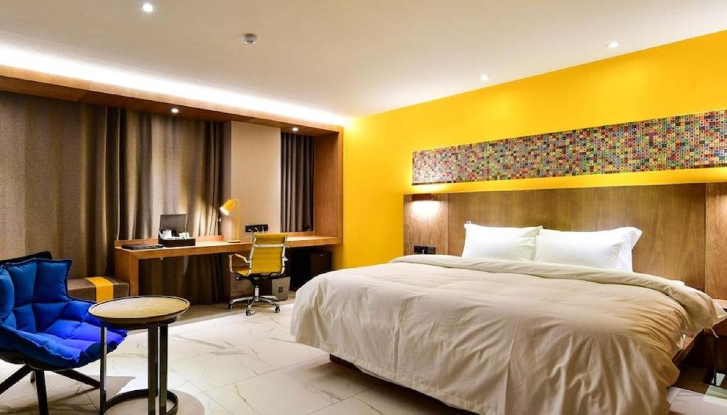 Postel nebo postele na pokoji v ubytování Hotel Ritz