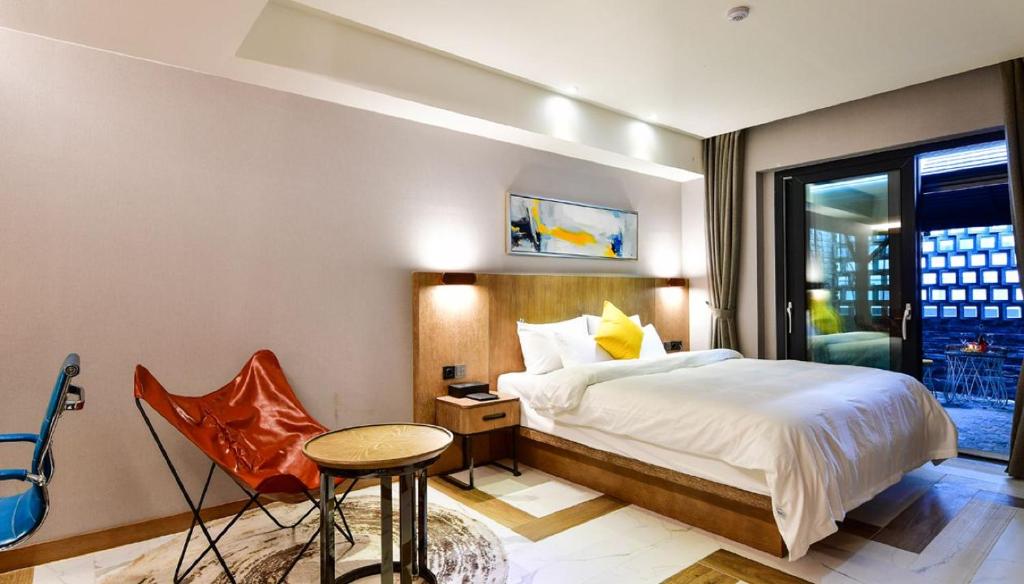 Postel nebo postele na pokoji v ubytování Hotel Ritz