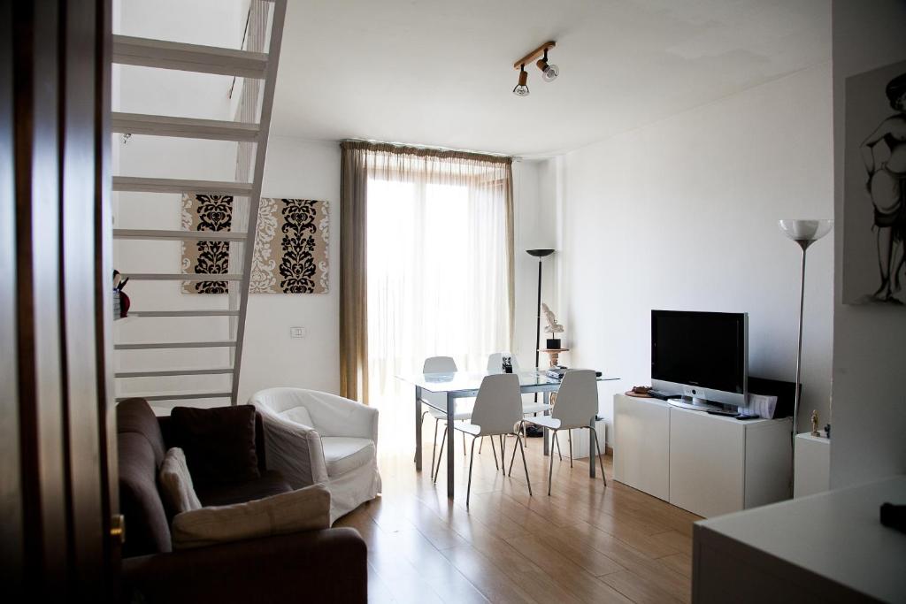 Telewizja i/lub zestaw kina domowego w obiekcie Alcalà Living Apartments