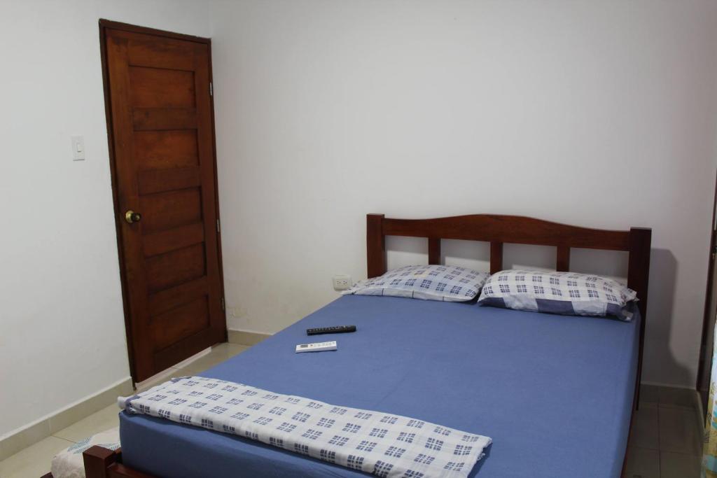 Postel nebo postele na pokoji v ubytování CASAS BLANCAS Coveñas