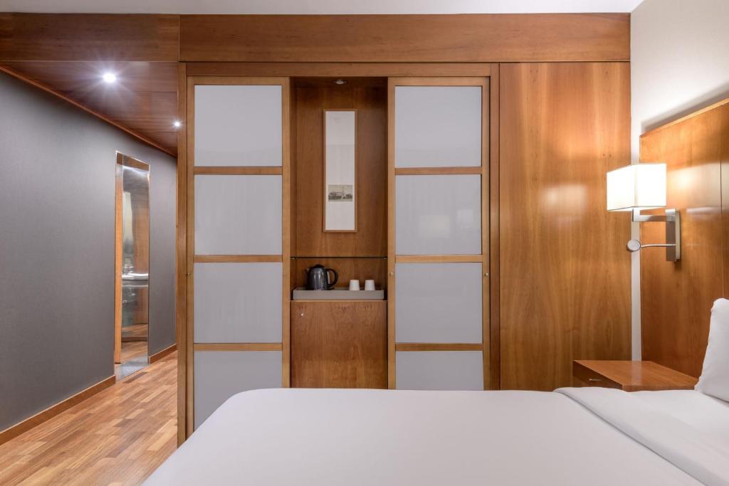 Postel nebo postele na pokoji v ubytování AC Hotel Aitana by Marriott