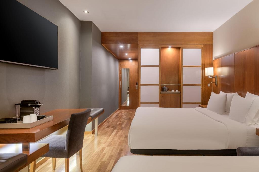 Postel nebo postele na pokoji v ubytování AC Hotel Aitana by Marriott
