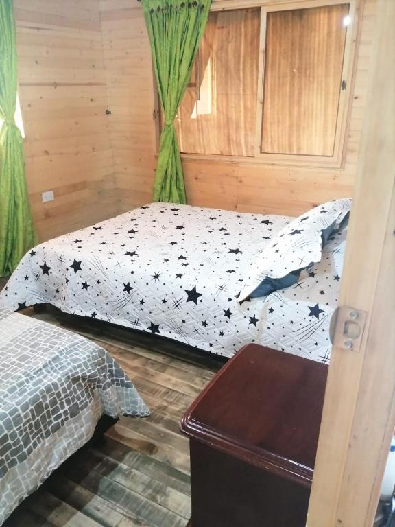 Postel nebo postele na pokoji v ubytování Finca Severo Refugio