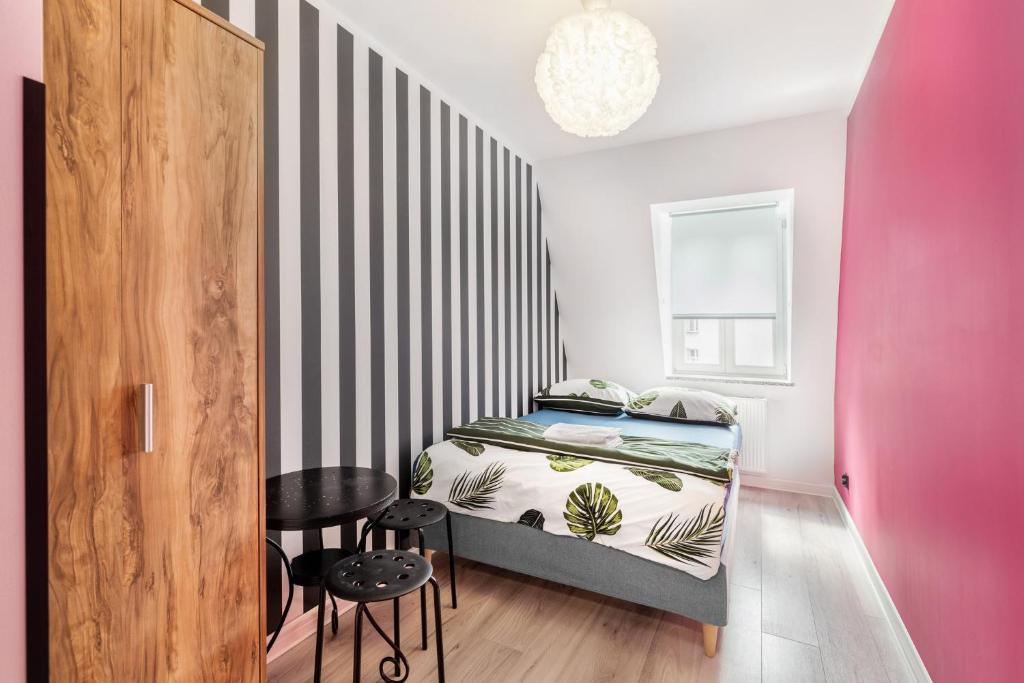 Postel nebo postele na pokoji v ubytování VICE CITY Hostel