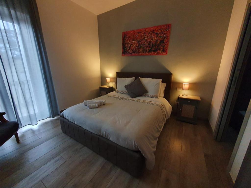 Postel nebo postele na pokoji v ubytování VILLA MATILDA luxury B&B