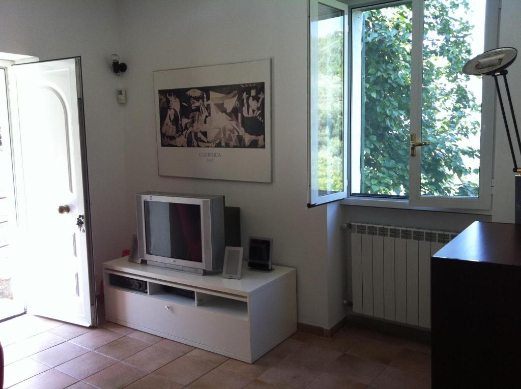 A television and/or entertainment centre at Dolcevia