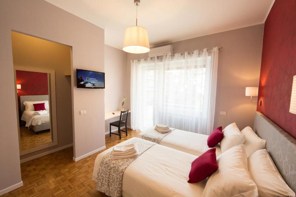 A bed or beds in a room at B&B Roma 474