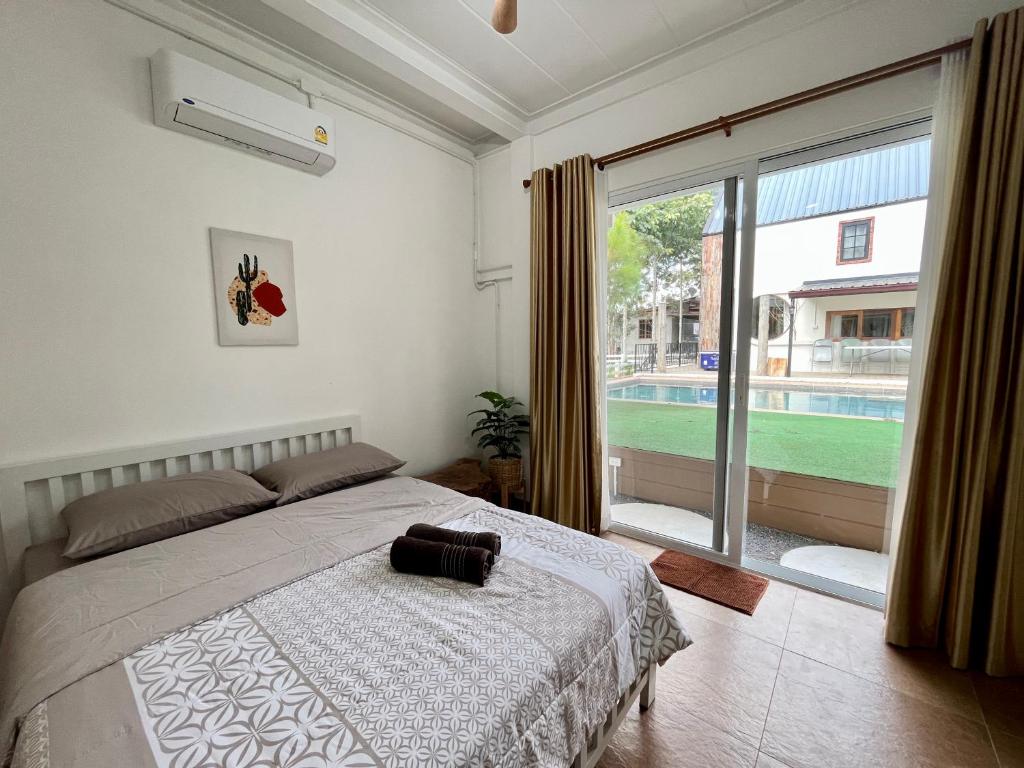 Postel nebo postele na pokoji v ubytování Blessing Moon Pool Villa Khaoyai