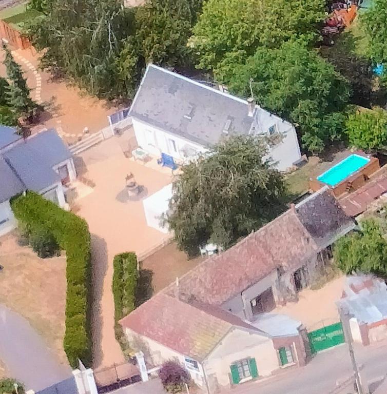 an aerial view of a house with a flooded yard at Chez Aurélia - Chambres &amp; Table d&#39;hôtes in La Couture-Boussey