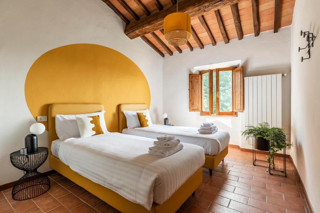 Postel nebo postele na pokoji v ubytování Selvuccia Lodge - Ostello Agricolo