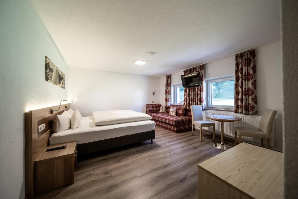 Postel nebo postele na pokoji v ubytování Appartements Tyrol