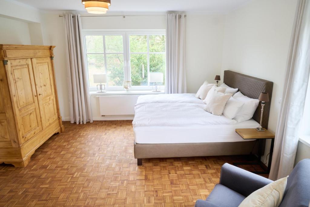 Postel nebo postele na pokoji v ubytování Landhaus Eichengarten